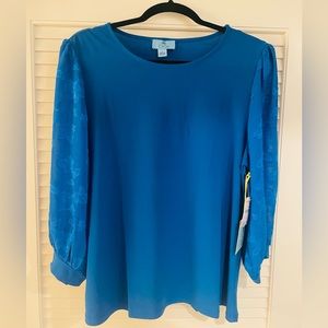 CeCe blouse. Beautiful blue color, Perfect for the holidays!